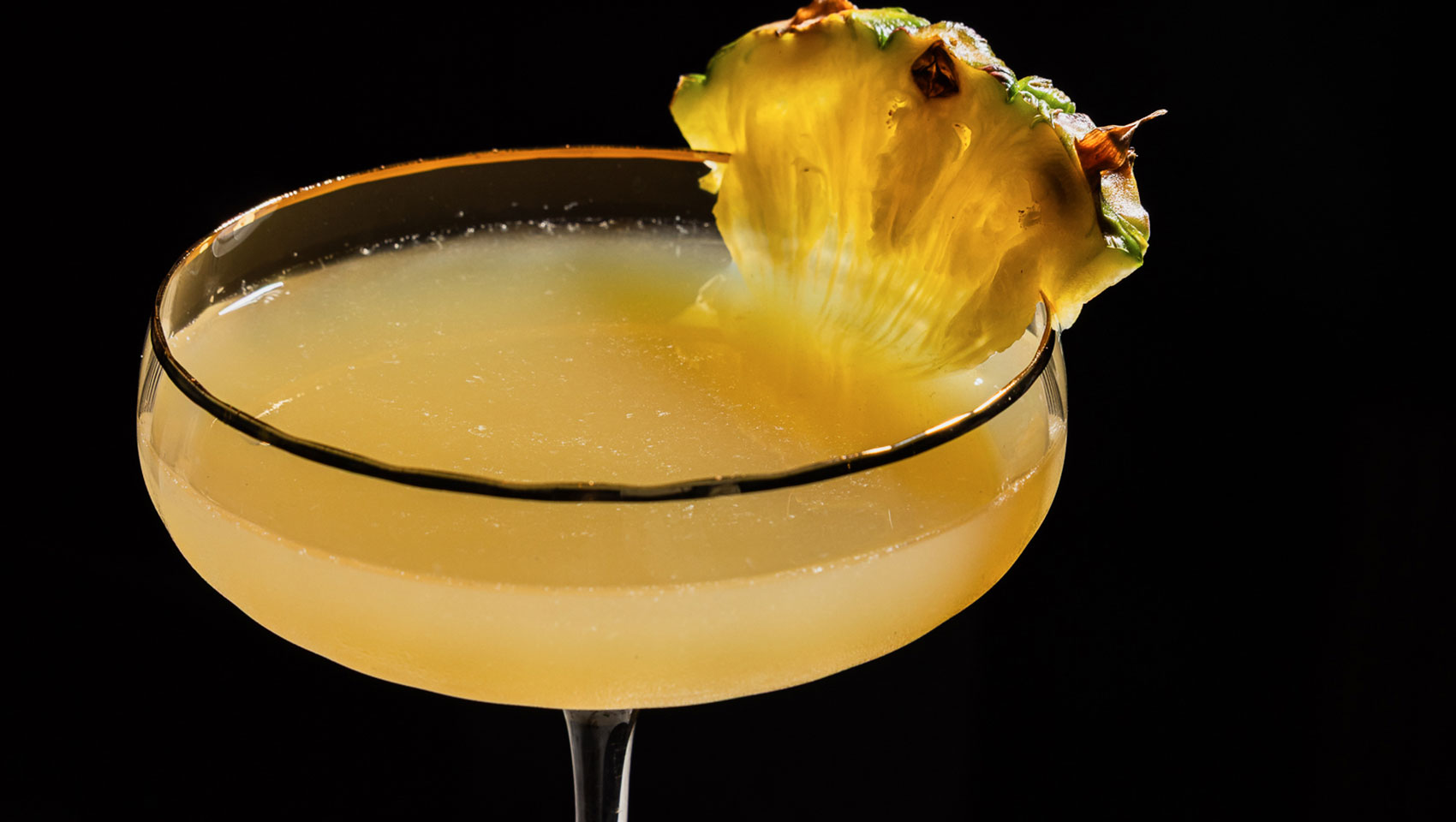 Cocktail with pineapple slice