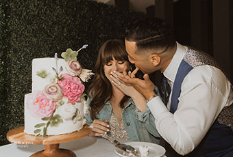 Couple with wedding cake