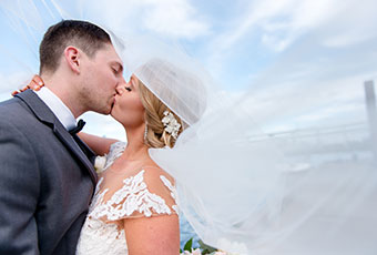 newlyweds kissing