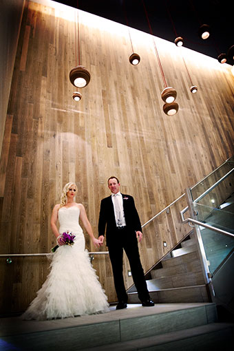 bride and groom on staircase
